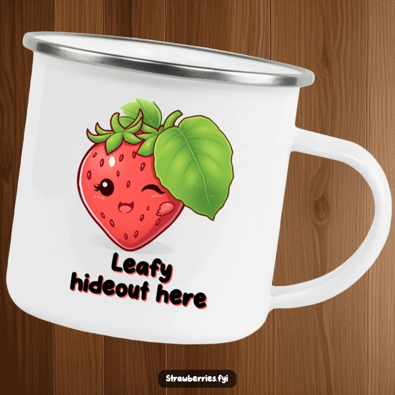 Funny camping mug with a mischievous strawberry character hiding behind a leaf, ideal for humorous outdoor sipping.