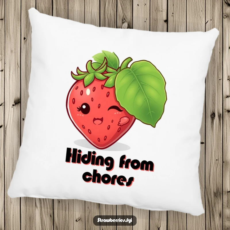 Funny pillow featuring a mischievous strawberry character hiding behind a large leaf, providing comfort and playful humor.