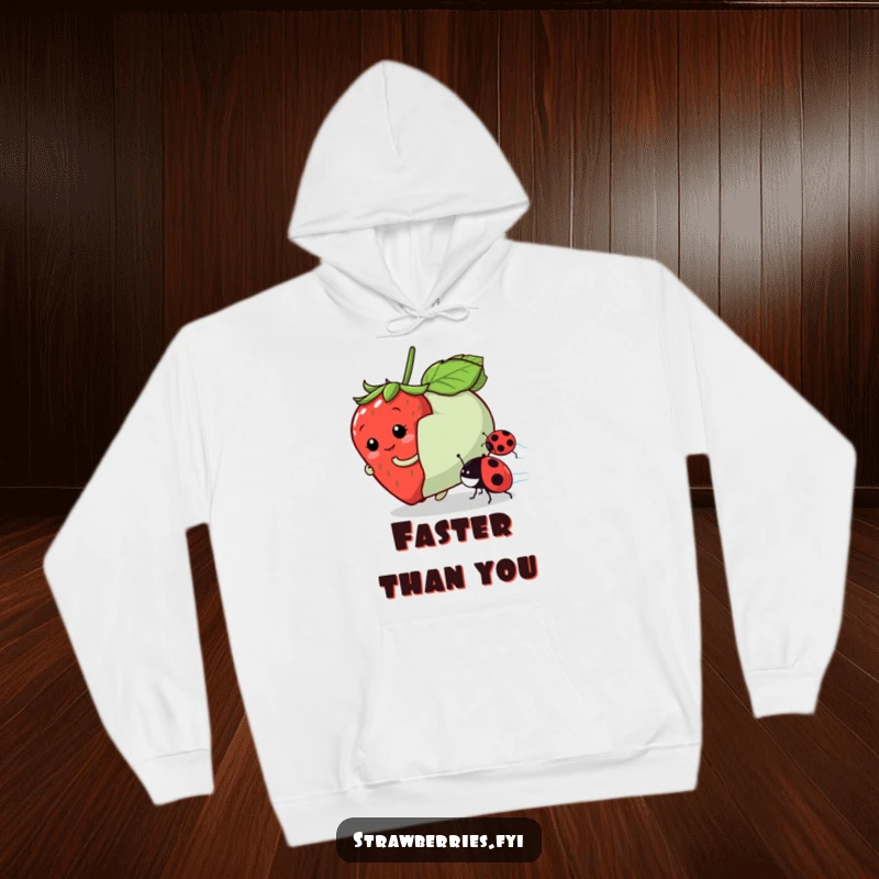 Funny hoodie showcasing a playful strawberry character in a race with a ladybug, perfect for cozy, humorous days.