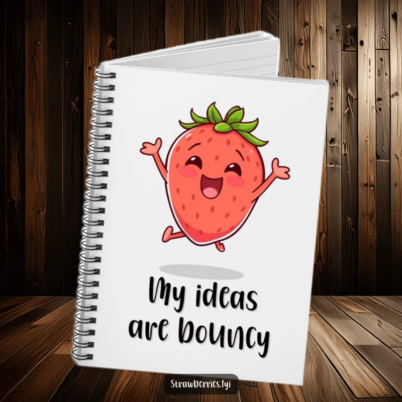 Funny notebook featuring an excited strawberry doing a jumping jack, perfect for capturing energetic thoughts with a vibrant touch.