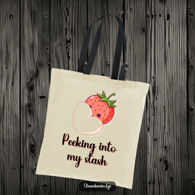 Funny tote bag with a shy strawberry peeking from behind a petal, perfect for carrying items with a gentle, sweet vibe.